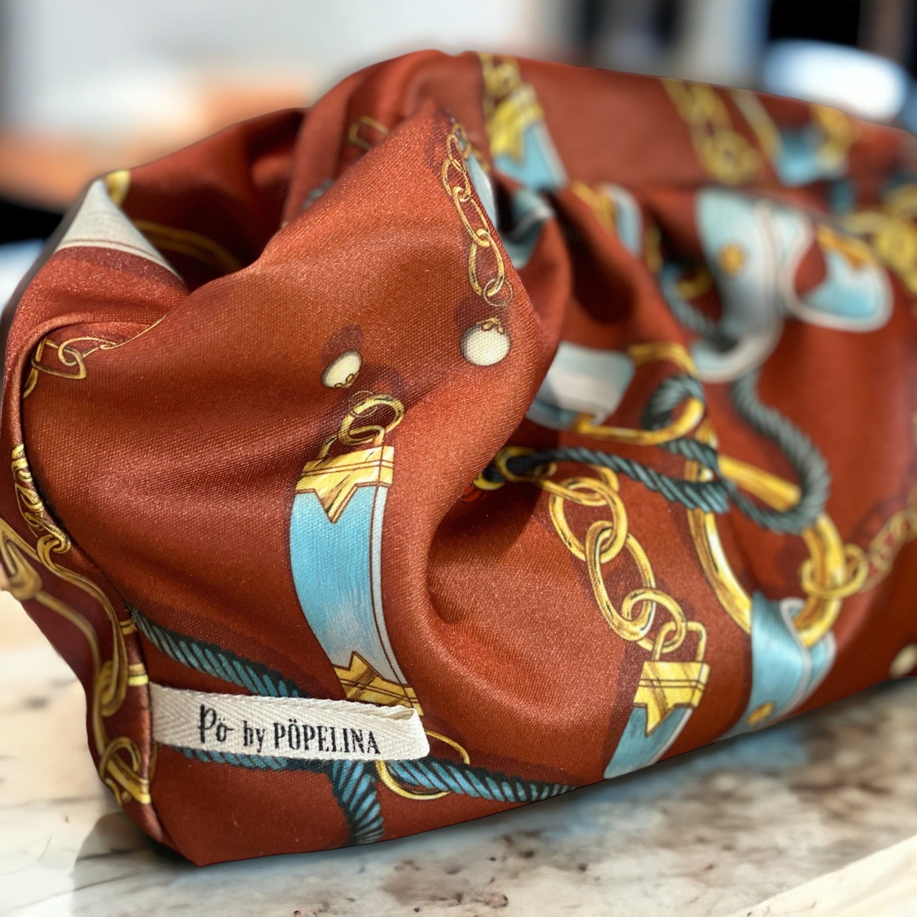 Detalle de bolso BombónCadenas marrón, colección Rimmini.